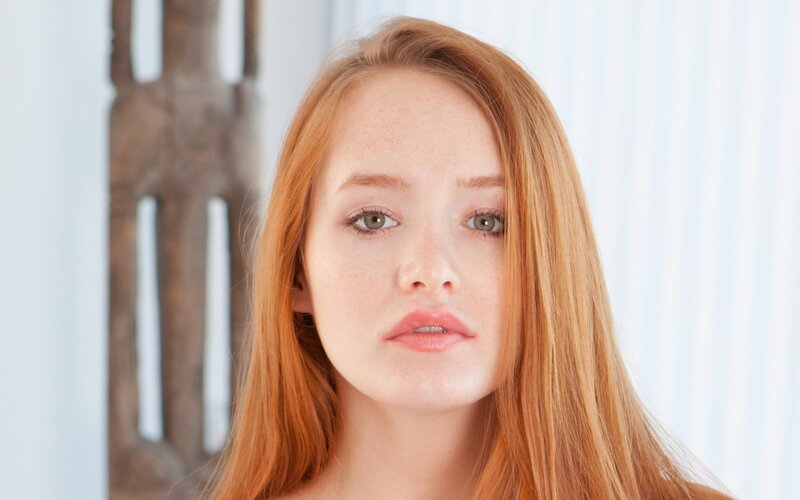 red-haired woman with green eyes