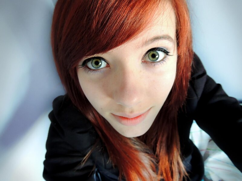 red-haired woman with green eyes