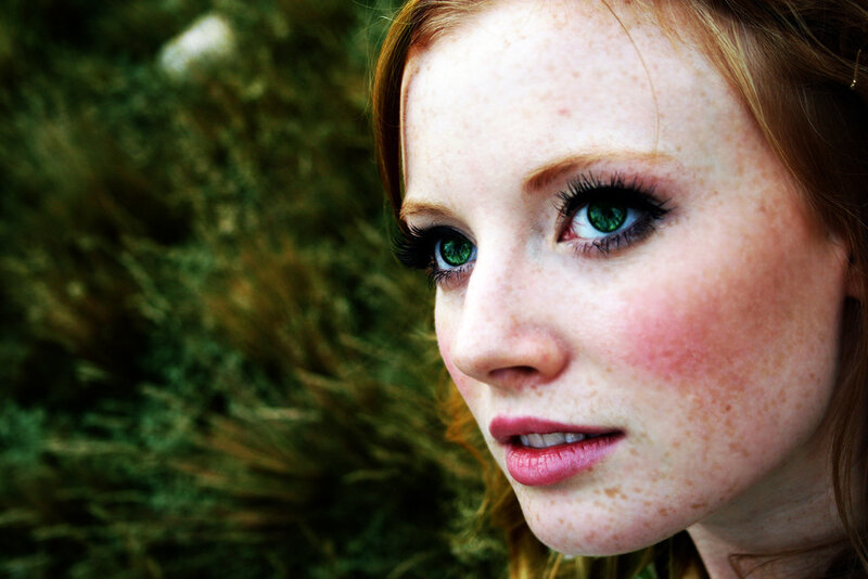 red-haired woman with green eyes