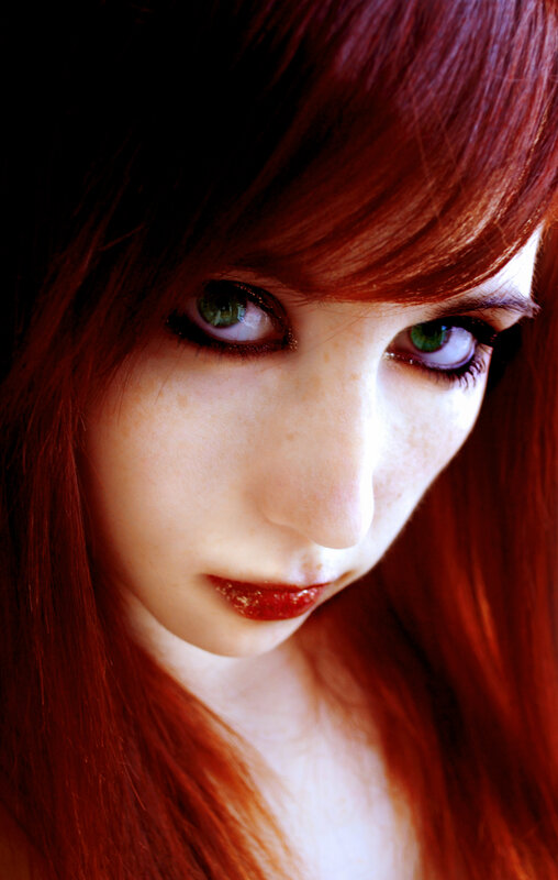 red-haired woman with green eyes