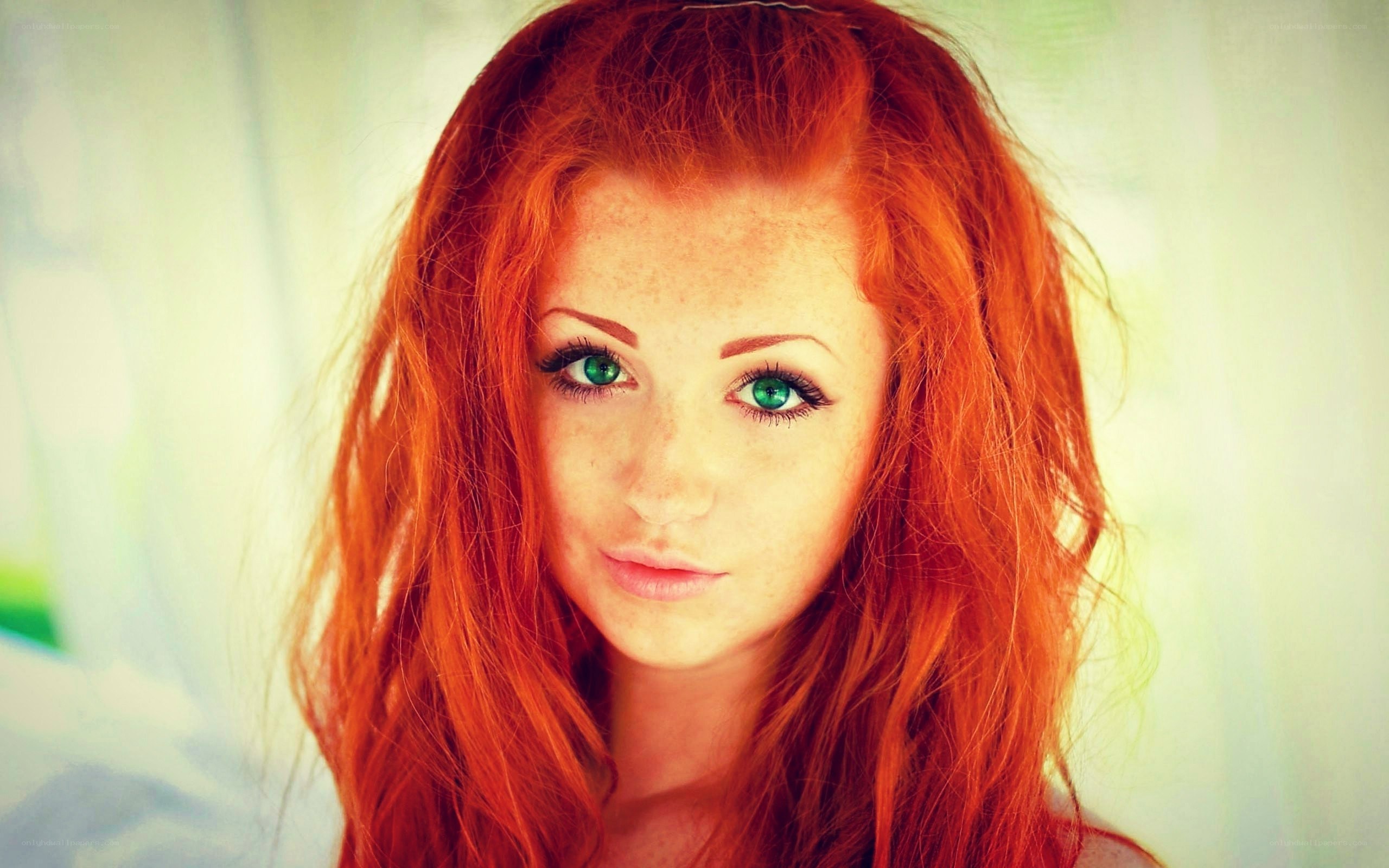 red-haired woman with green eyes