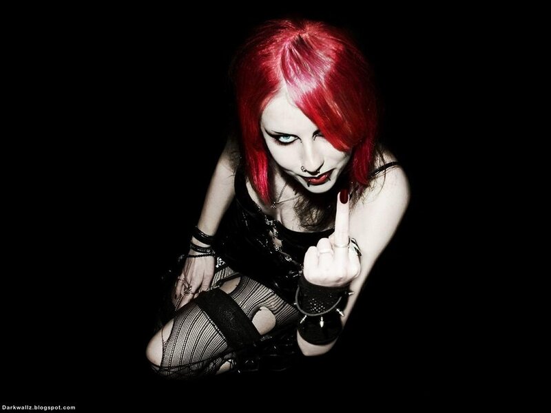 red-haired woman with middle finger