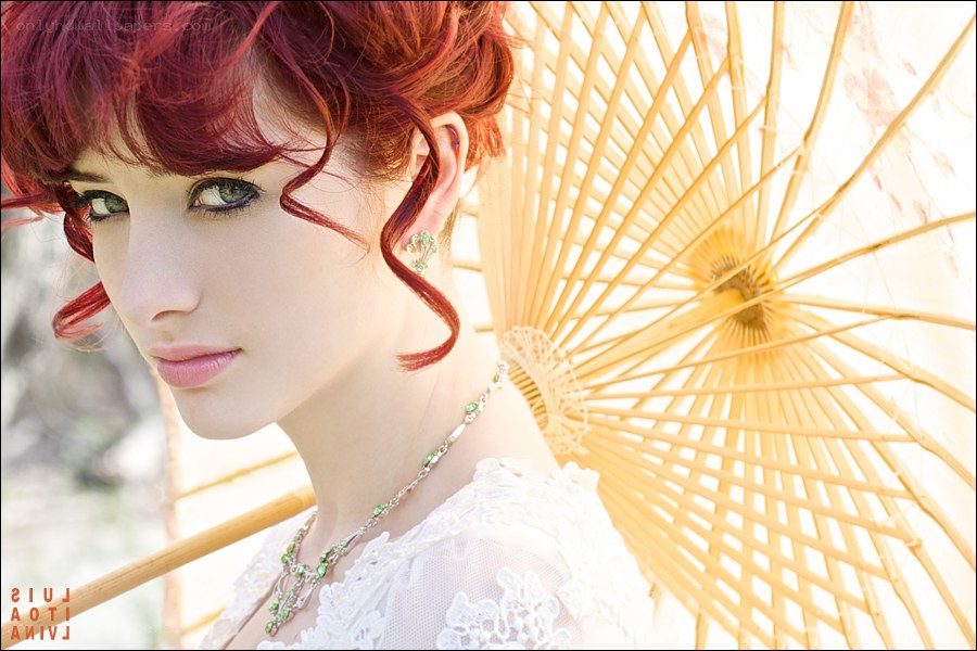 Red-haired woman with parasol
