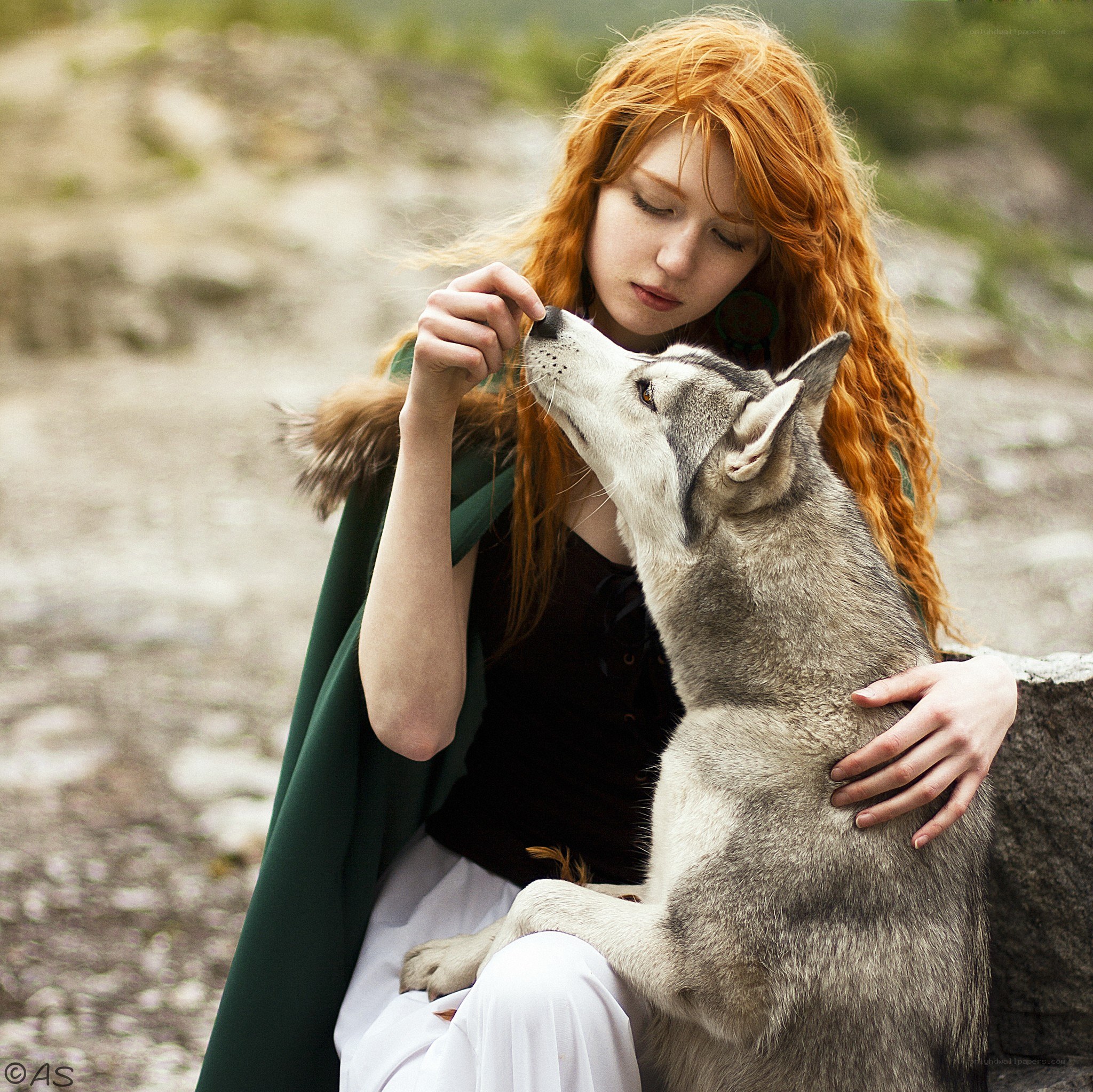 Red-haired woman with wolf