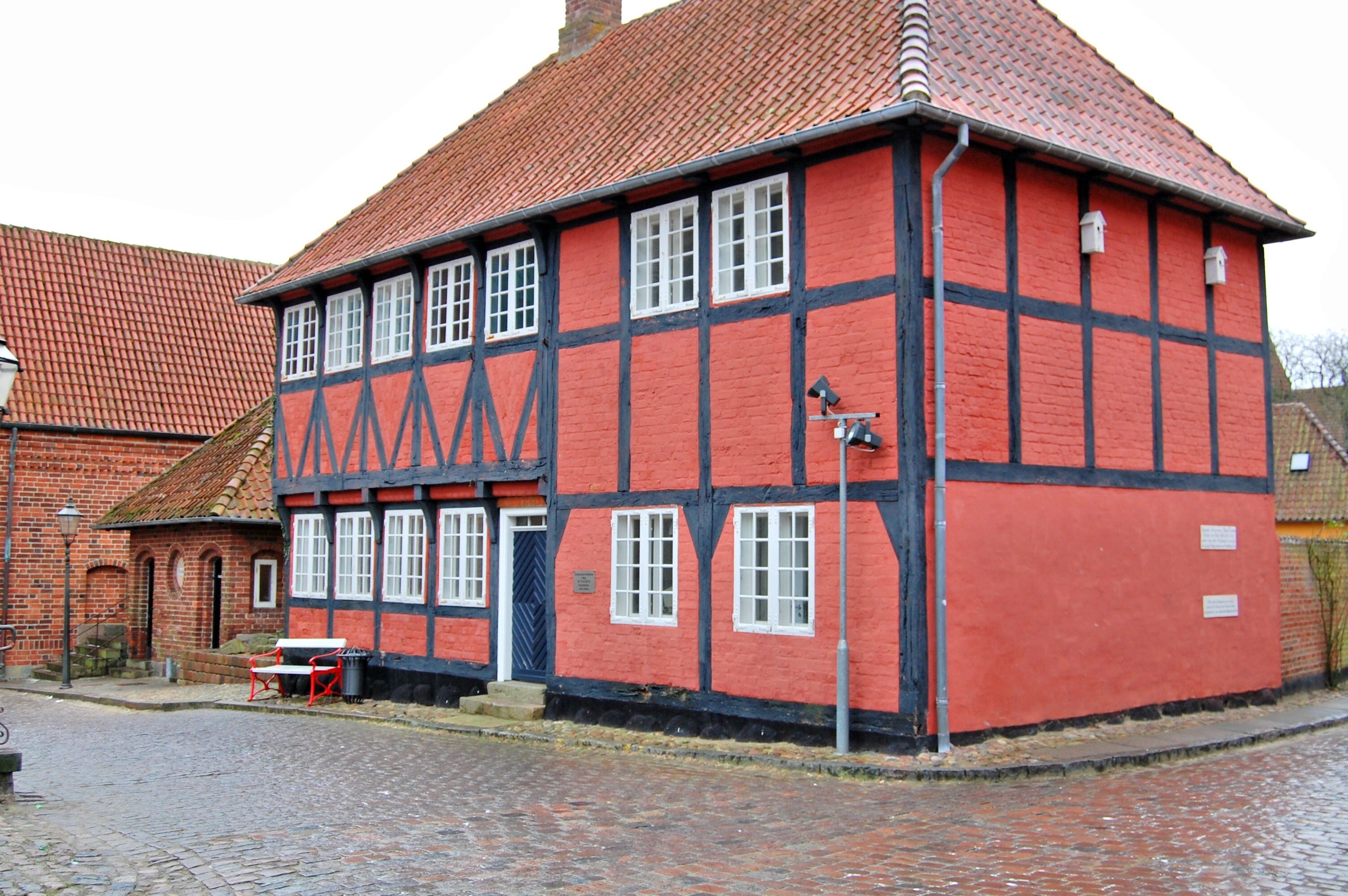 Red half-timbered house in town