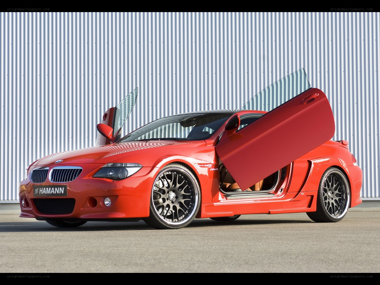 Red Hamann BMW with doors open