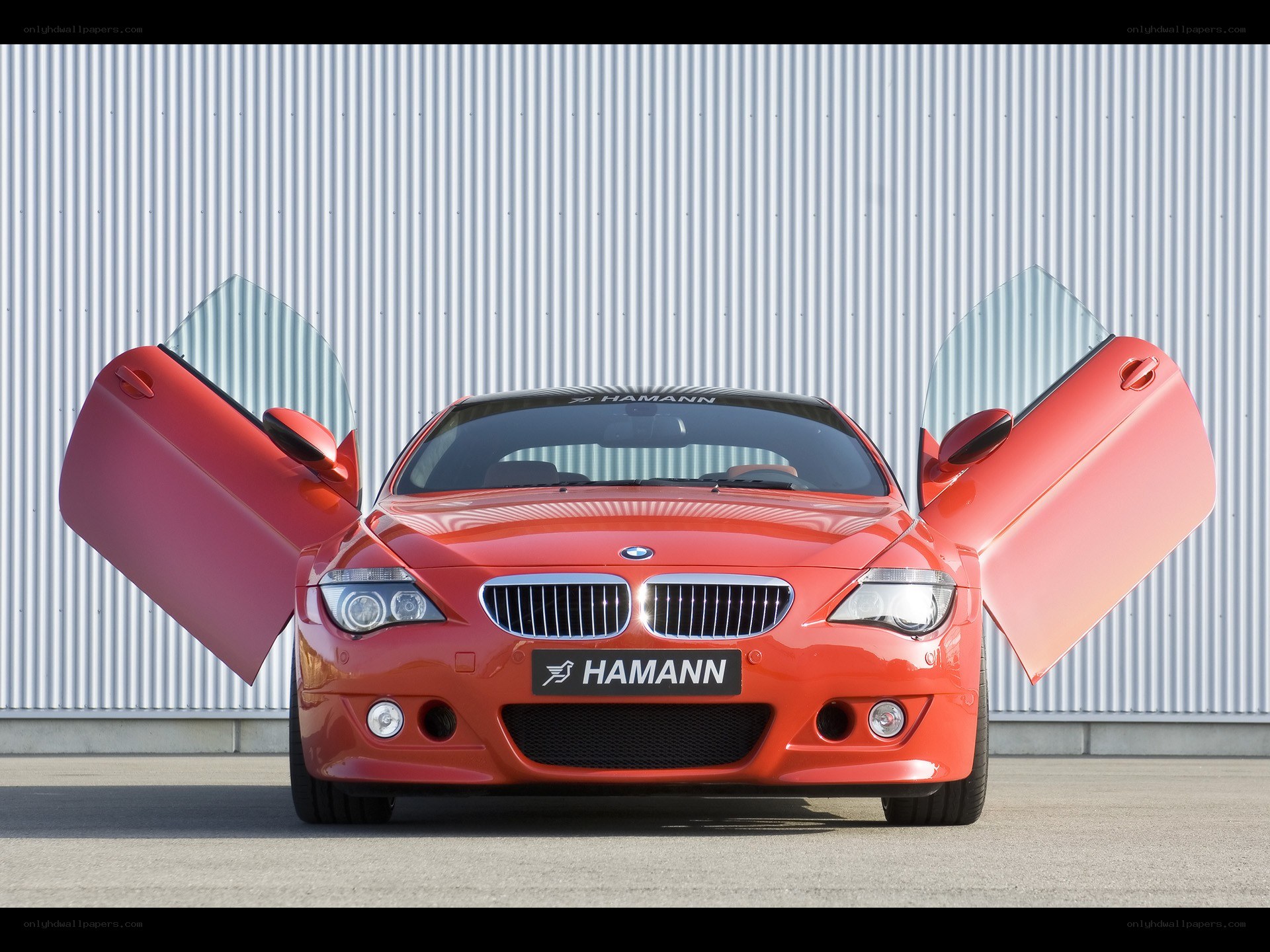 Red Hamann BMW with doors open