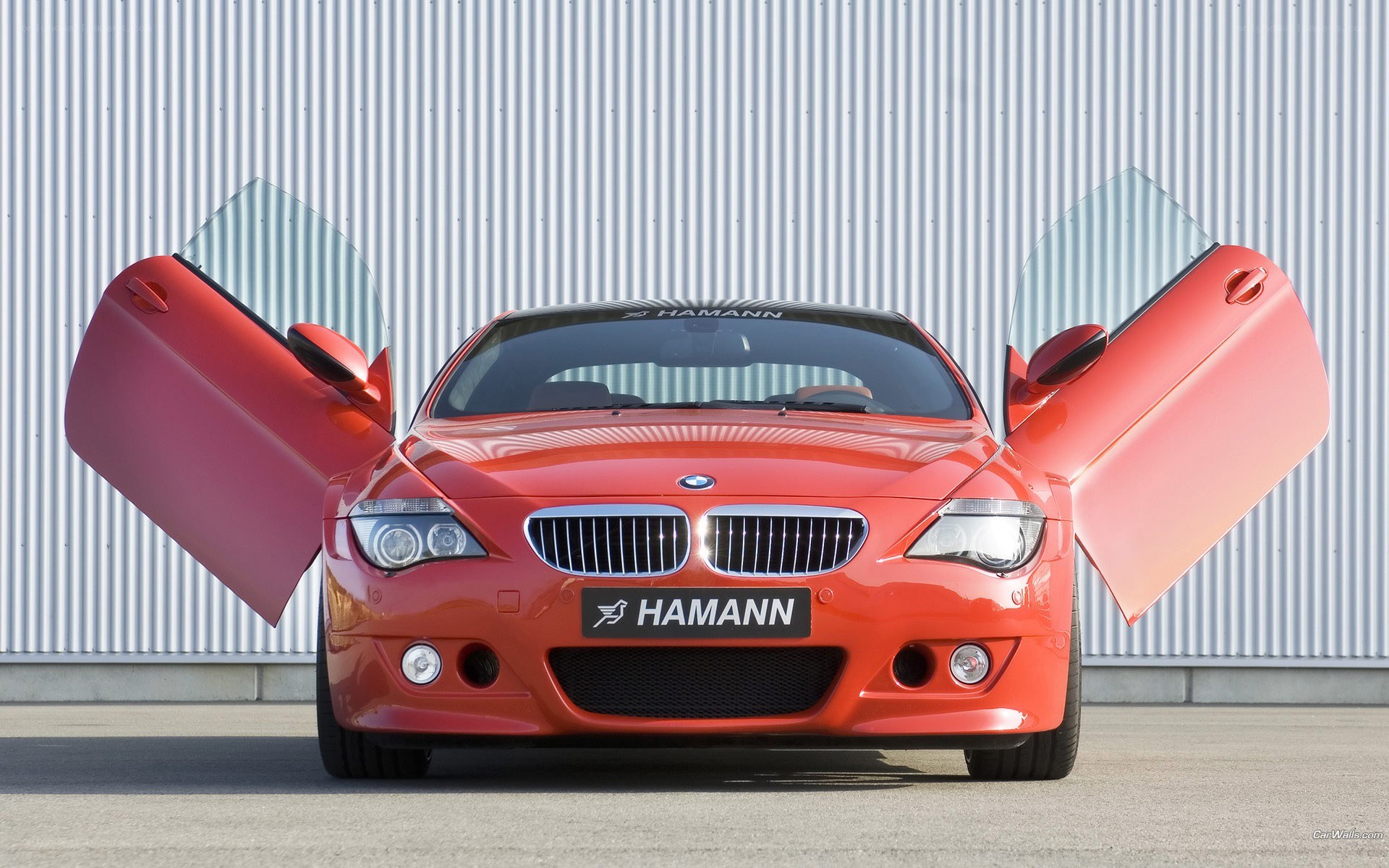 Red Hamann BMW with doors open