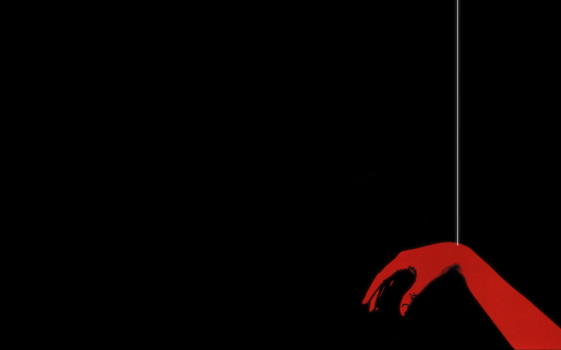 Red hand reaching for light