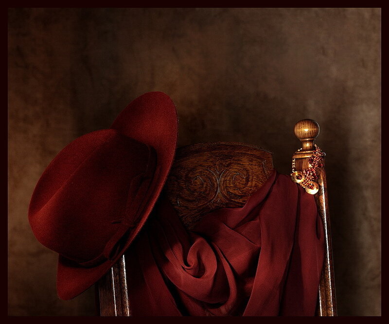 Red hat and scarf on chair