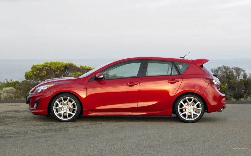 Red Hatchback Car — Calm, Afternoon, Photograph, Ocean