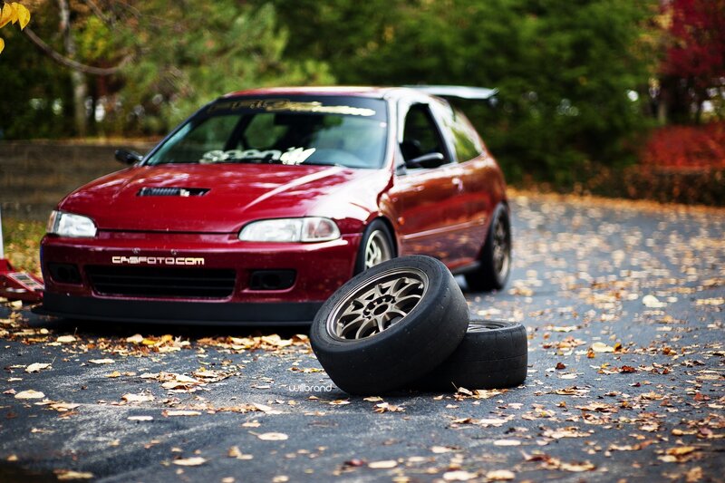 Red Hatchback Car — Calm, Autumn, Photograph