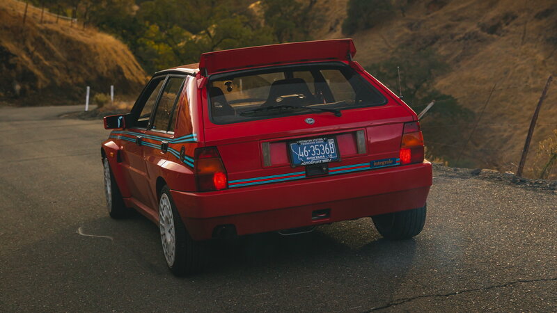 Red Hatchback Car — Dramatic, Sunset