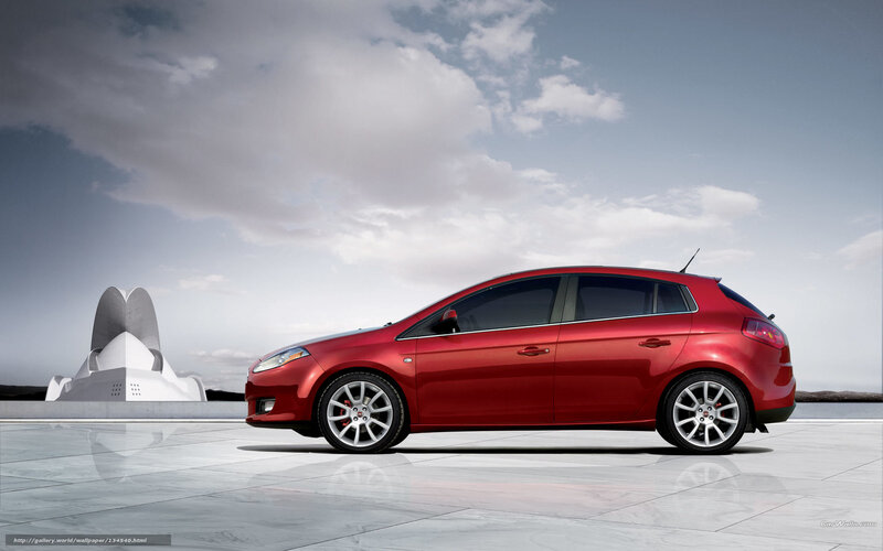 Red hatchback car on display