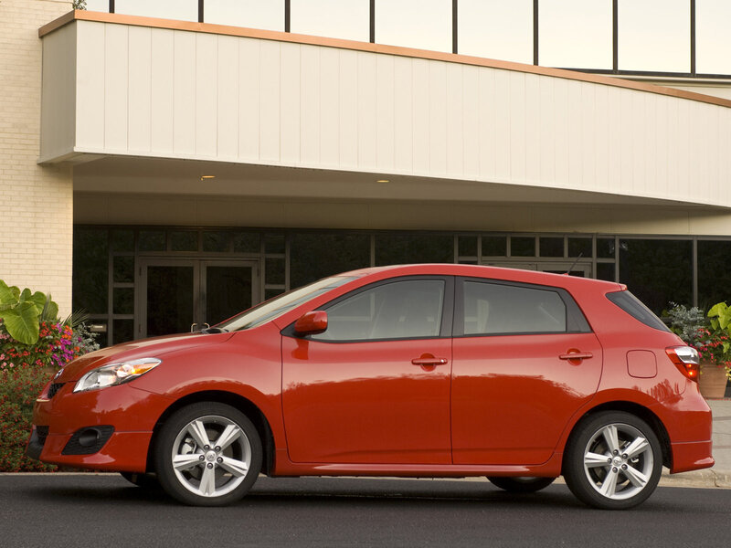 Red hatchback car parked