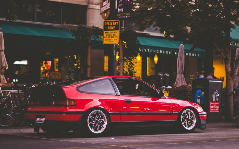 Red Hatchback Car — Urban