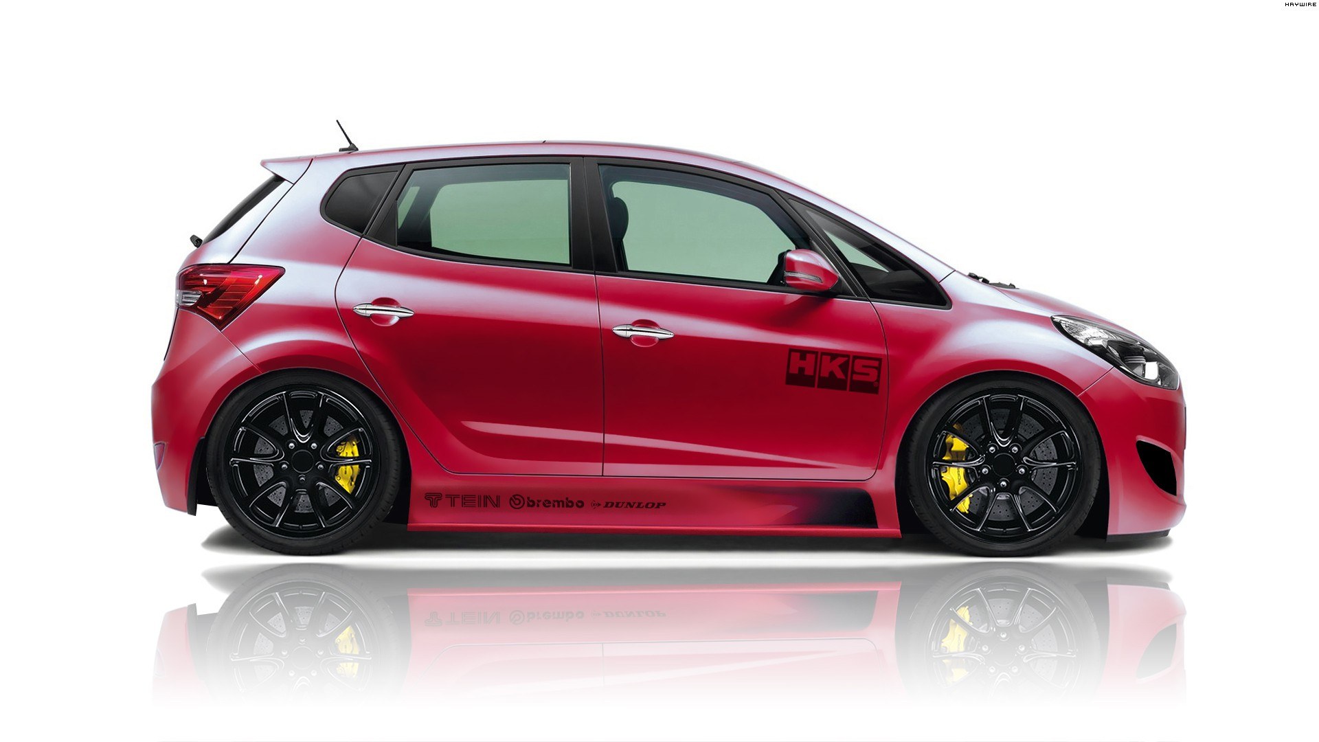Red hatchback car with performance parts
