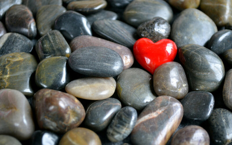 Red Heart Among Pebbles