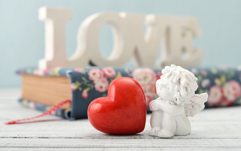 Red Heart and Angel Figurine — Serene