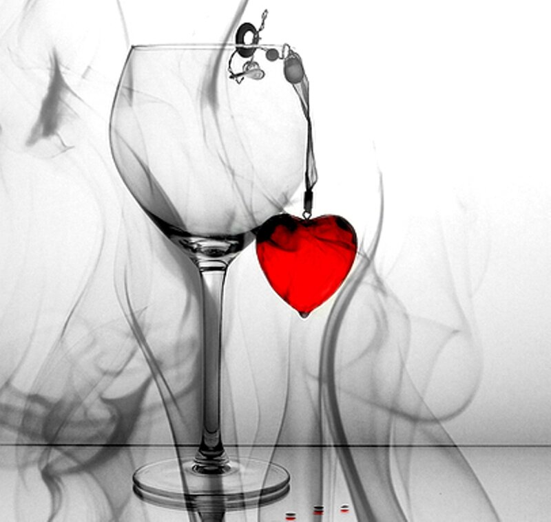 Red Heart Hanging from Wine Glass