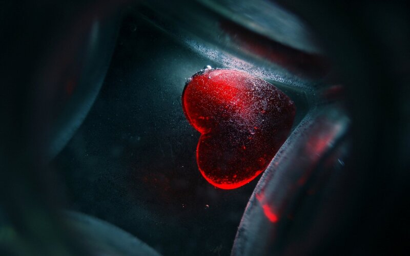 Red Heart in Dark Container — Dramatic
