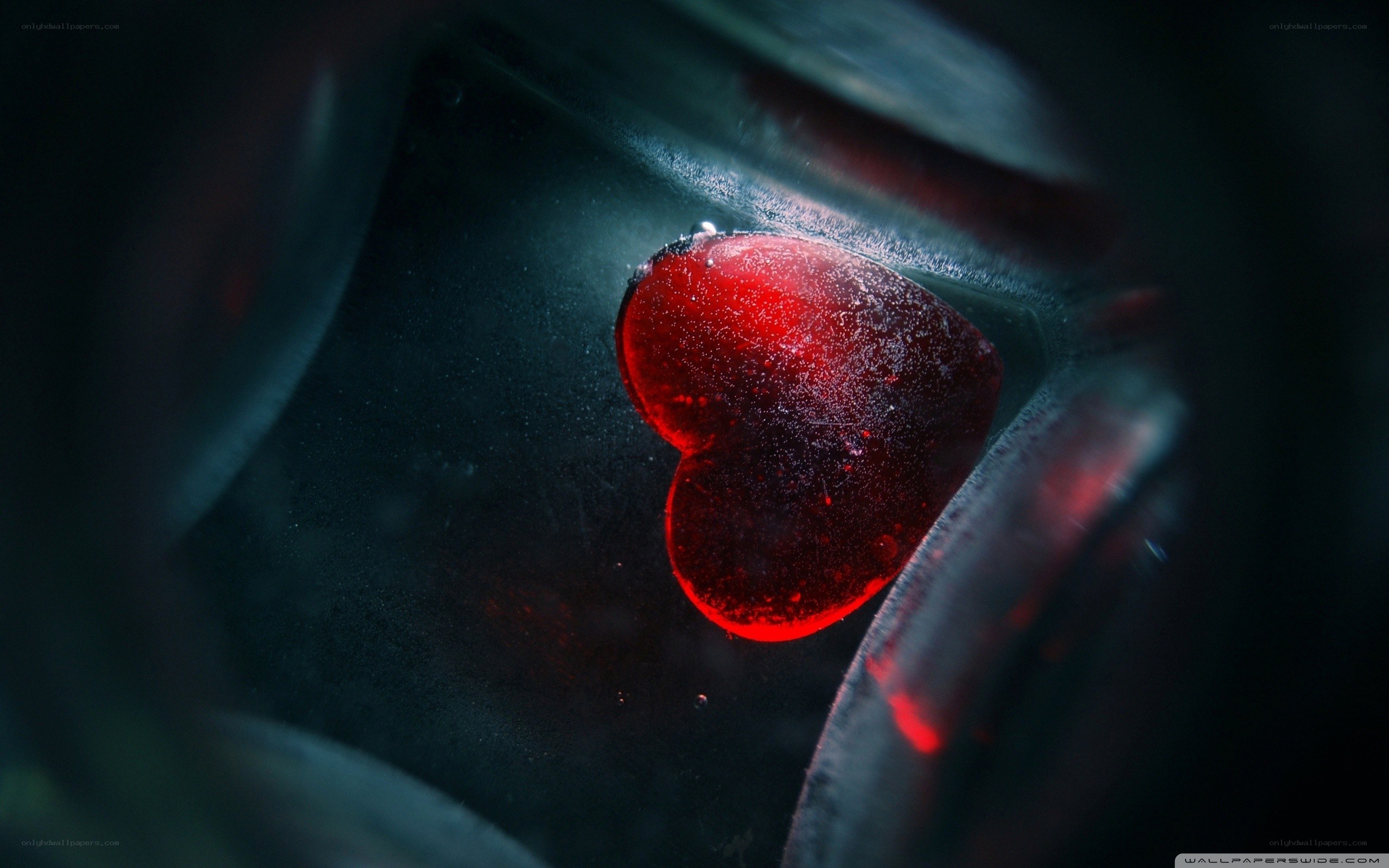 red heart in dark glass