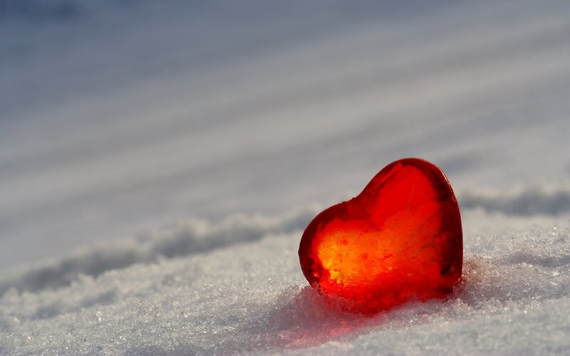 Red heart in the snow