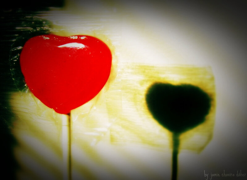 Red heart lollipop and shadow