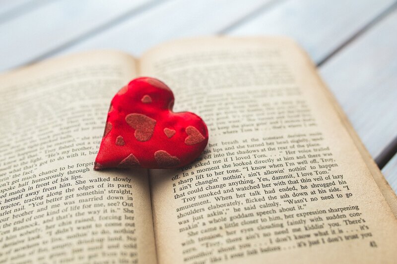 Red Heart on Book — Calm, Photograph, Text