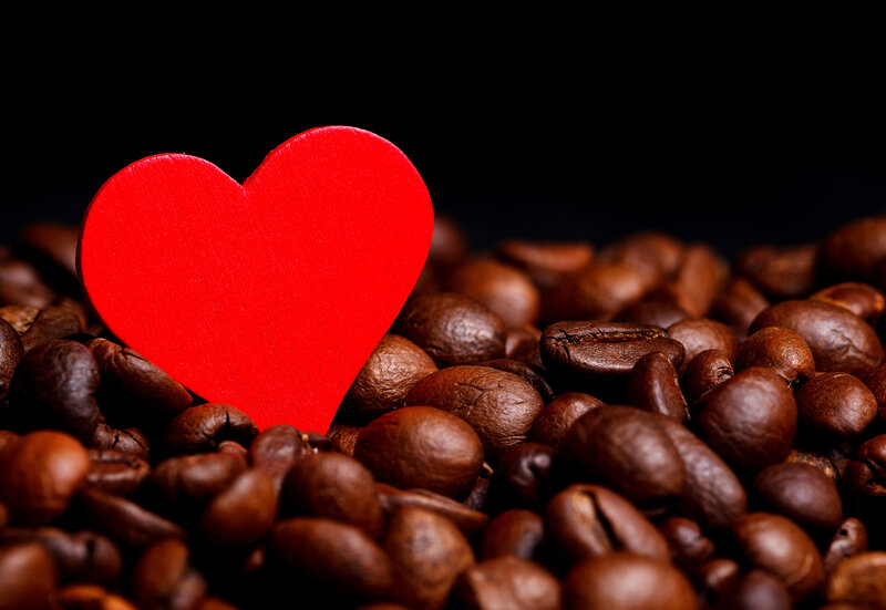 Red Heart on Coffee Beans — Dramatic
