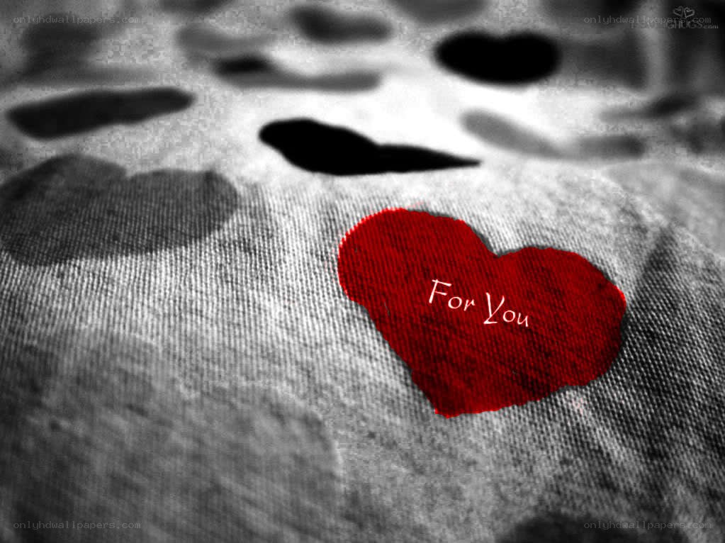 Red heart on fabric
