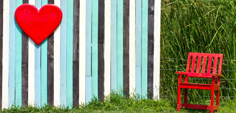 Red Heart on Fence — Serene