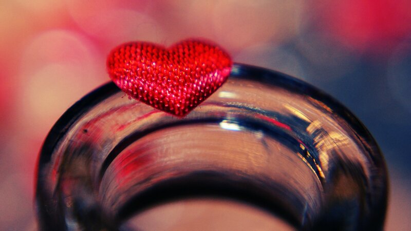 red heart on glass rim