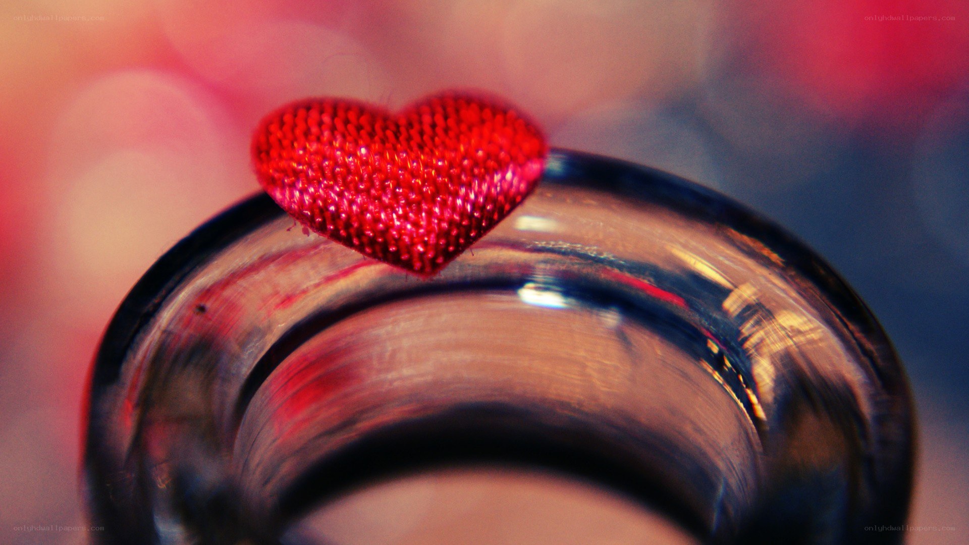 red heart on glass rim