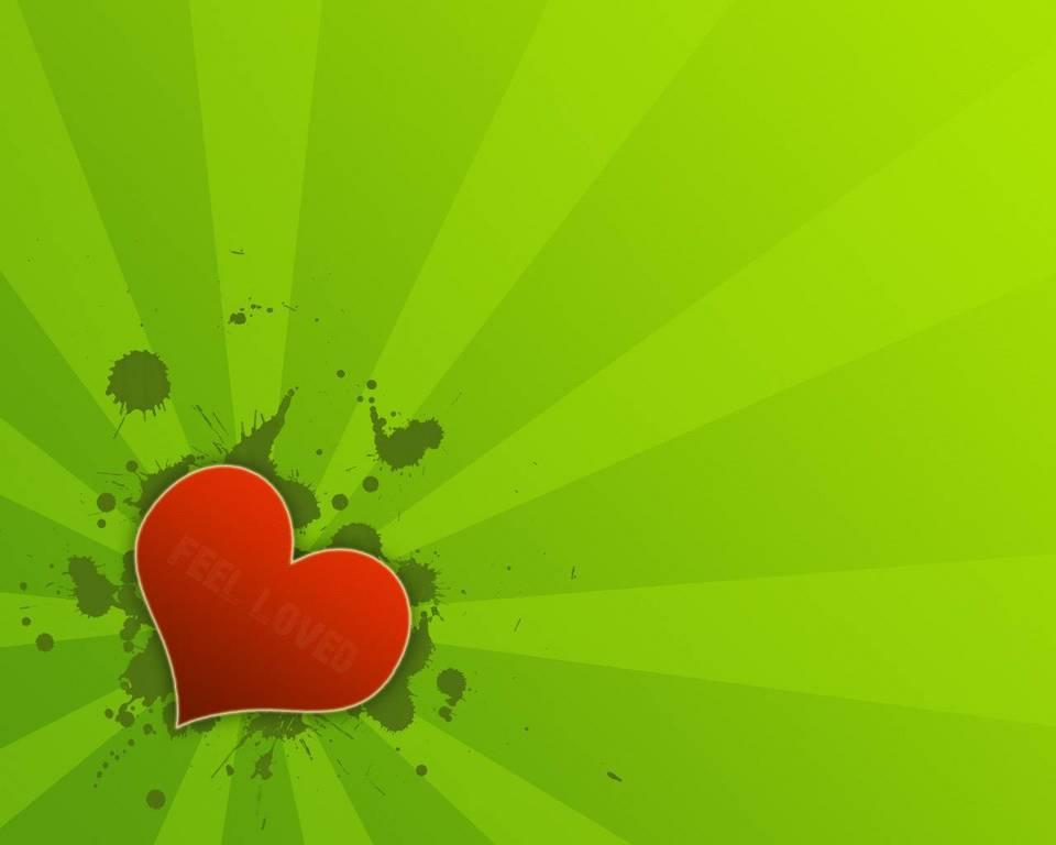 red heart on green background