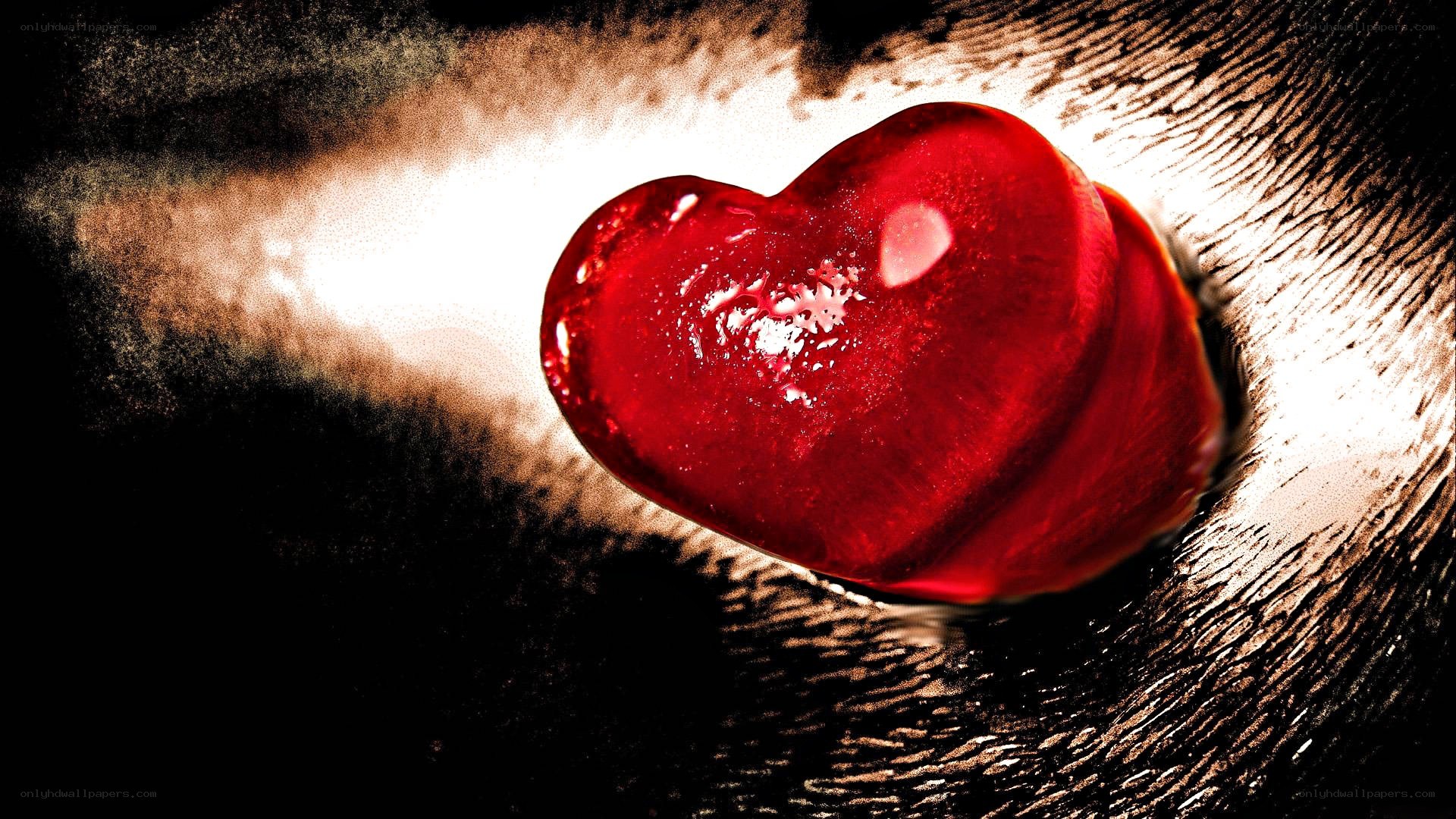 red heart on wooden surface