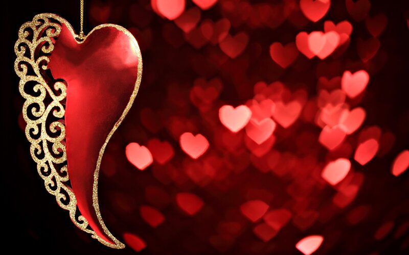 red heart ornament with bokeh