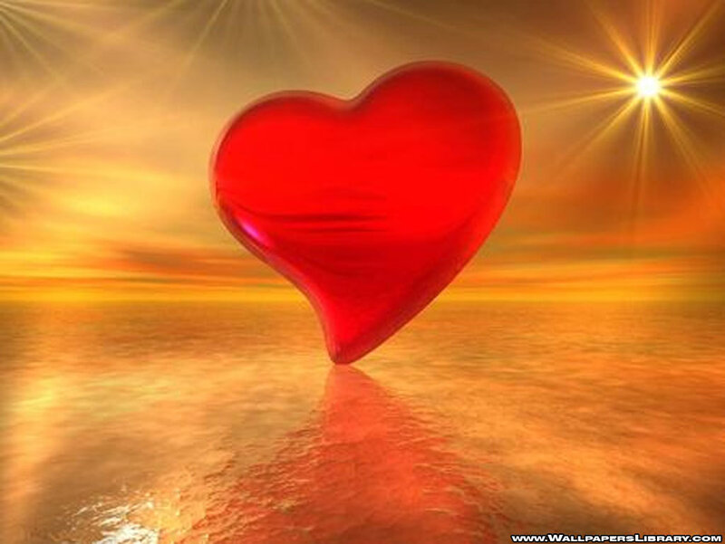 Red heart over golden water