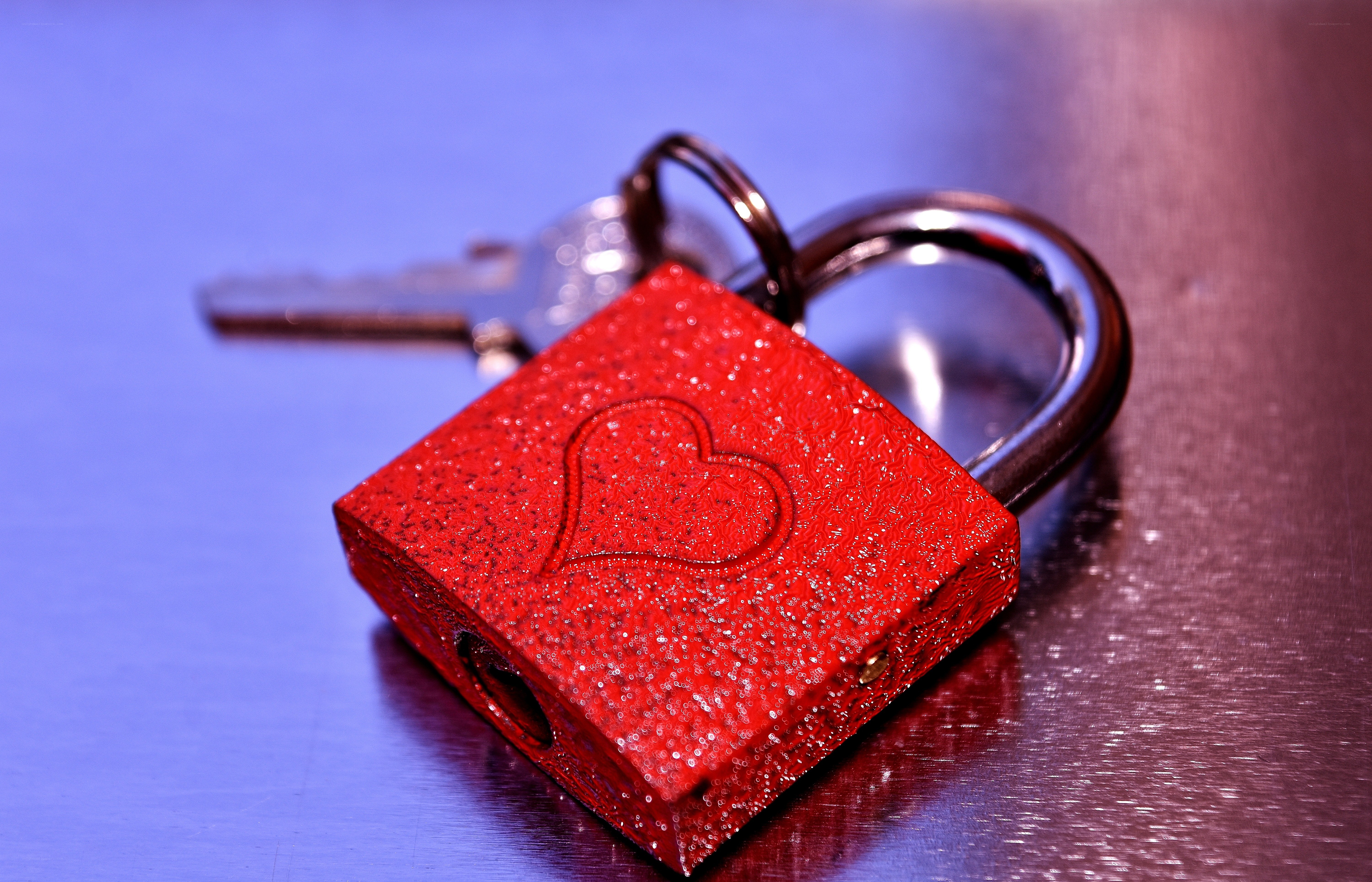 Red heart padlock with key