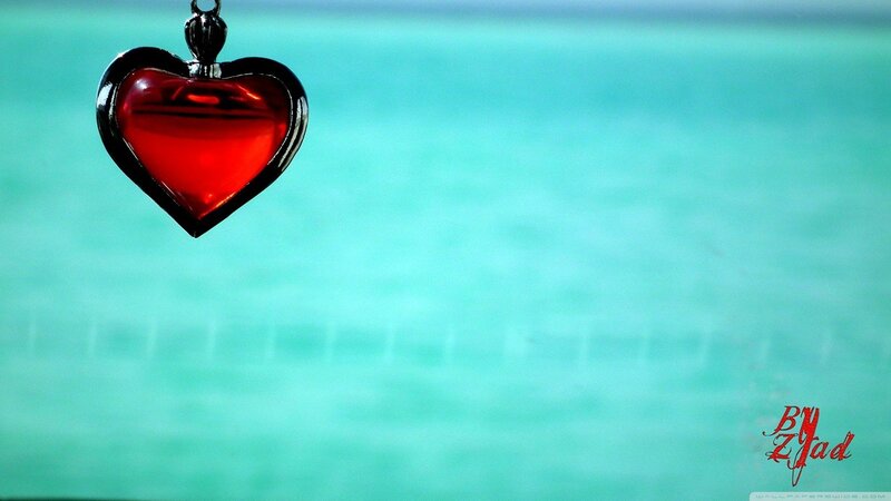 Red heart pendant on turquoise