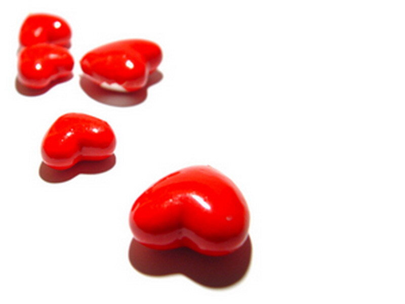 Red heart-shaped candies