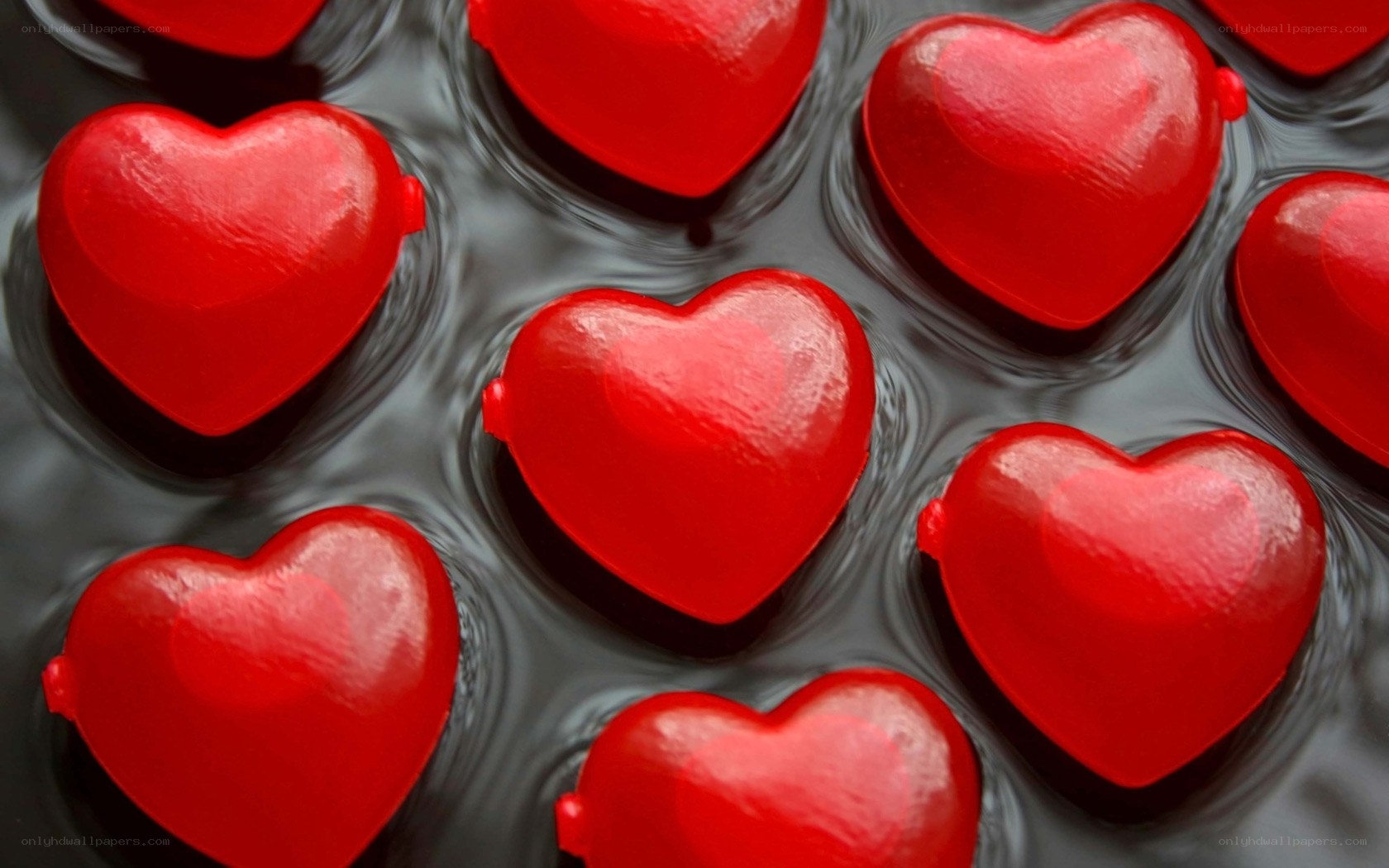 Red heart-shaped candies