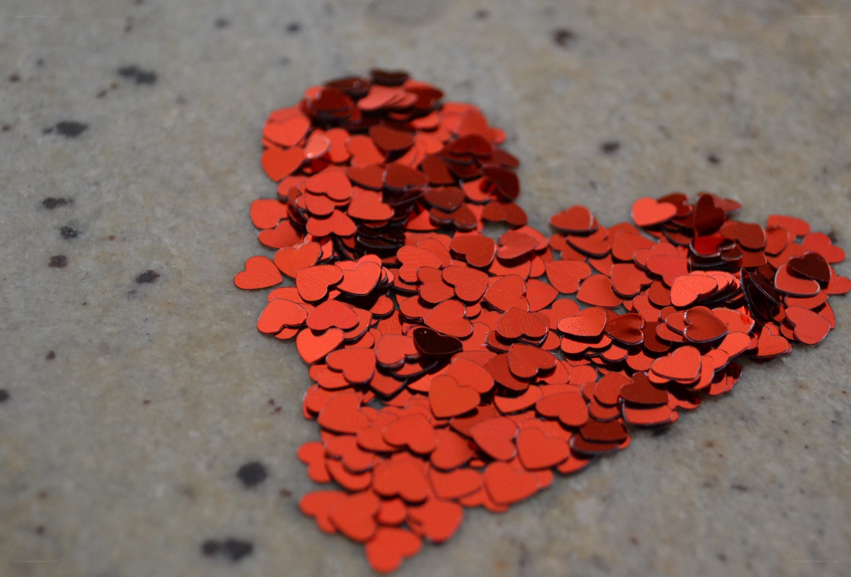 Red heart-shaped confetti
