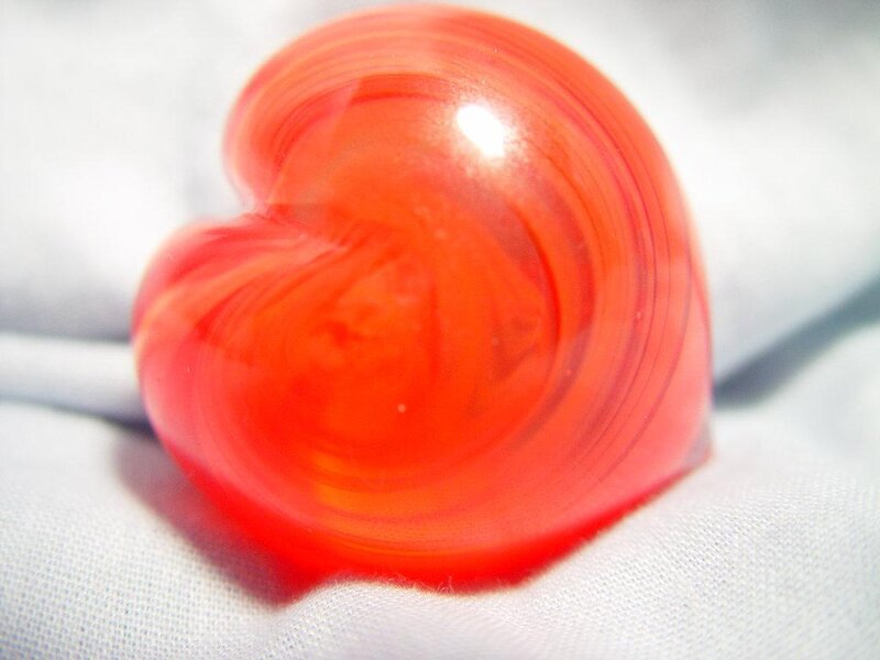Red heart-shaped object