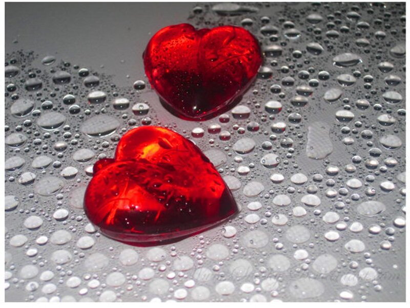 Red Heart-shaped Objects — Calm, Photograph, Drops