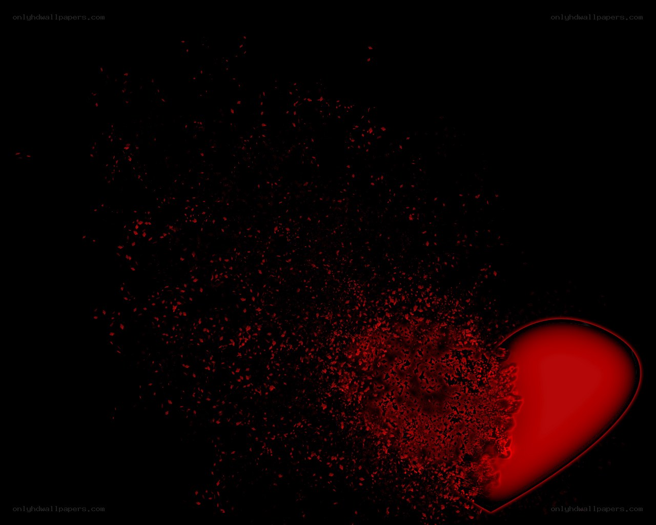 Red heart shattering into pieces
