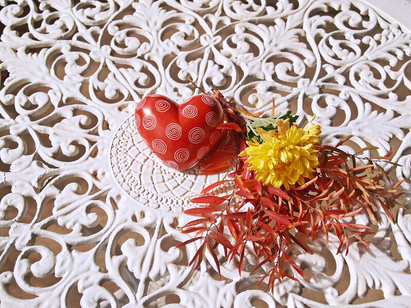 Red heart with autumn flowers