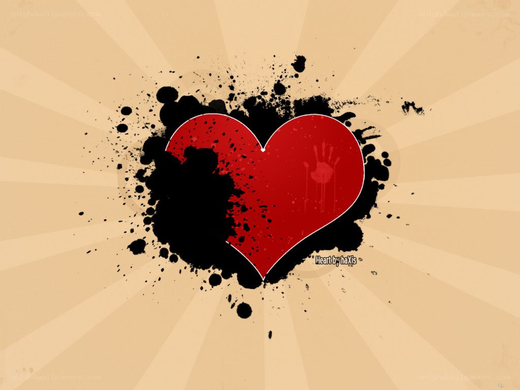 red heart with black splatter