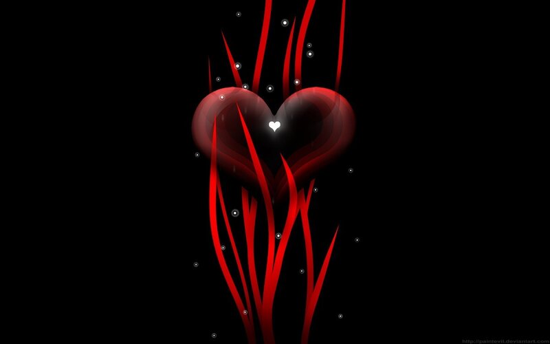 Red heart with glowing particles
