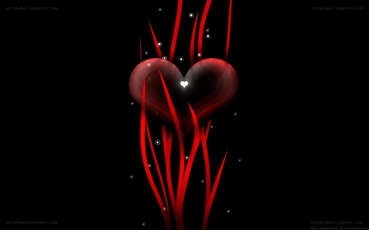 Red heart with glowing particles